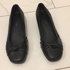 Black leather flats